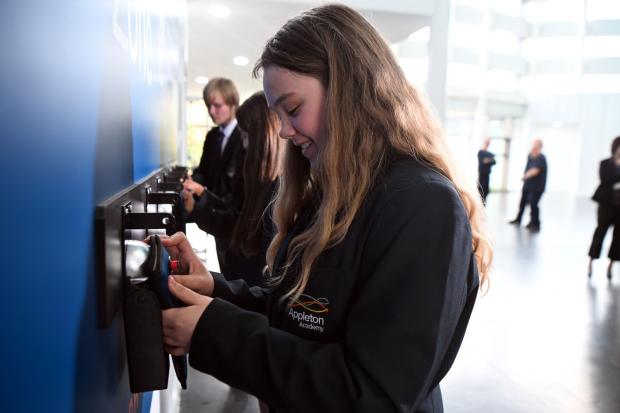A pupil unlocking their pouch (Image: Newsquest/Mike Simmonds)